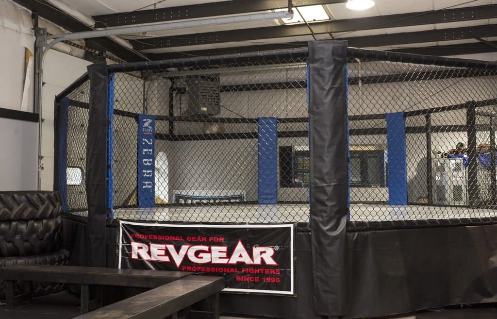 The 22 foot cage and heavy bags inside Method MMA